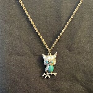 Charming Silver and Blue Owl Necklace with Intricate Details